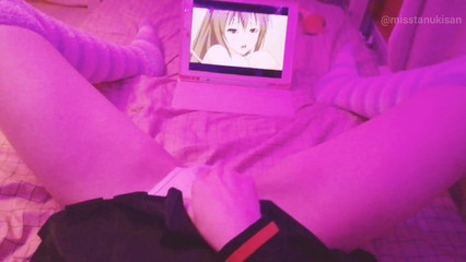 Молодая девчонка смотрит аниме порно и ласкает свою писечку